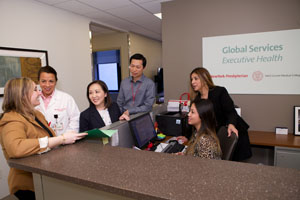 Global Services staff around reception desk