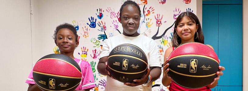 kids with basketball in their hands