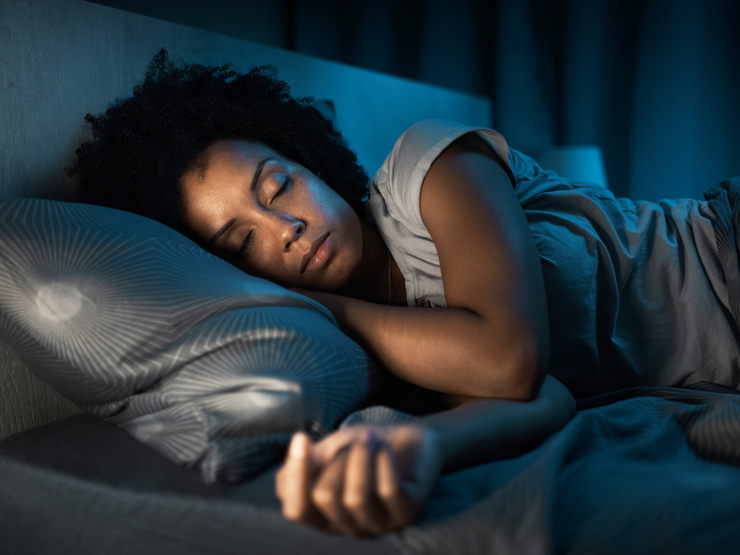 image of woman following good sleep tips and asleep in bed